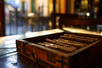 Tuinposter Box of cuban cigars on wooden table, atmospheric light. Generative AI © marcin jucha