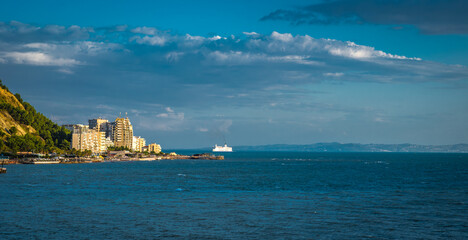 currilave beach shoreline with hotels in Durres, Albania during sunset