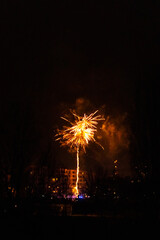 Capturing the Magic of New Year's Eve: Berlin Skyline Illuminated by Dazzling Fireworks Celebration in a City Alive with Joy and Lights