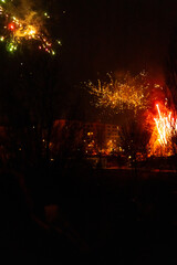 Capturing the Magic of New Year's Eve: Berlin Skyline Illuminated by Dazzling Fireworks Celebration in a City Alive with Joy and Lights