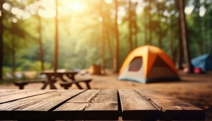 Blurred camping and tents in forest Wood table. - obrazy, fototapety, plakaty