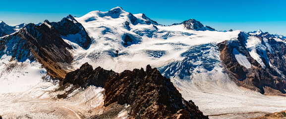 High resolution stitched alpine summer panorama at Wildspitzbahn cable car, Pitztal Glacier, Imst,...