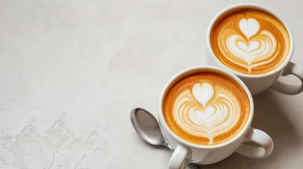 Foto op Plexiglas  two cups of cappuccino sitting on top of each other with hearts drawn on the top of the cups. © Oleg