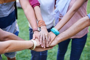 People, teamwork and hands together of friends outdoor for support, solidarity or mission of...