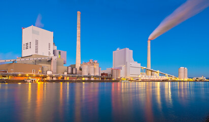 Panorama of a large coal power plant at the river rhine in Mannheim - Germany