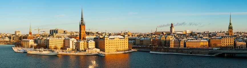 Large detailed panorama of the old town of Stockholm with Riddarholmen, in winter with snow and...