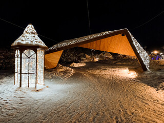 Street lighting of the city park, winter evening, art objects on the city street, lighting with...