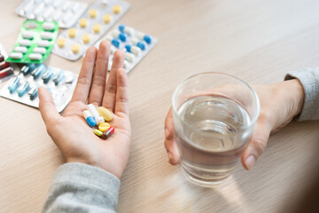 Health care of sickness, illness asian young woman, girl hand holding, take pills capsule,...