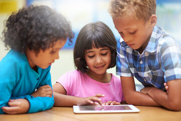 Happy children, tablet and students in classroom for elearning, education or online lesson at...