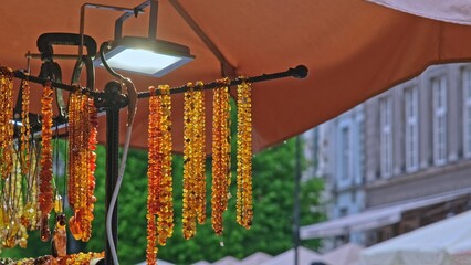 Expensive Amber Bead Necklace Sold on Outdoor Jewelery Market Stand