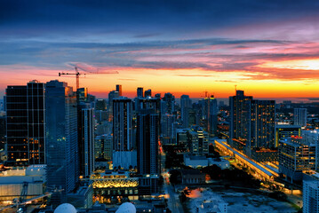 Aerial View of Miami City at Sunset From Building Top. Behold the breathtaking beauty of Miami City...