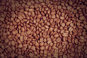 Brown roasted coffee beans, The dried coffee beans, background.