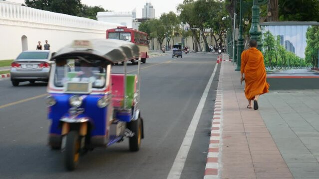 Monk and Tuk Tuk taxi in Bangkok