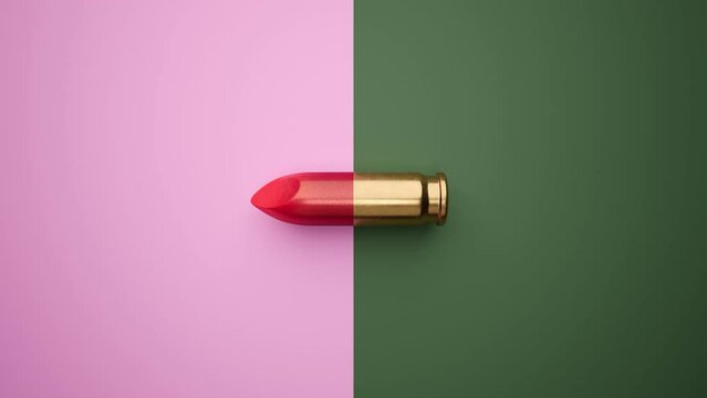 Bisected Lipstick and bullet. Ammunition shell and red tip cut in the middle.