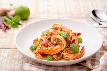 Spicy salad with shrimp.Thai style prawn salad with lemongrass shallot mint mixed with Chili Paste...