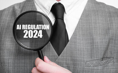 AI REGULATION 2024 on magnifying glass and businessman