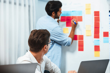 Group of diverse office worker employee take note and brainstorming on strategic business marketing...