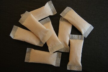 Pile of nicotine pads on a dark background. High quality photo