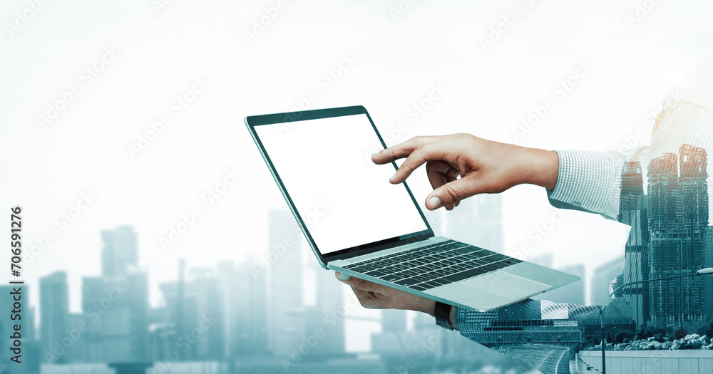 Poster double exposure image of businessman using computer on abstract modern city background. future busin