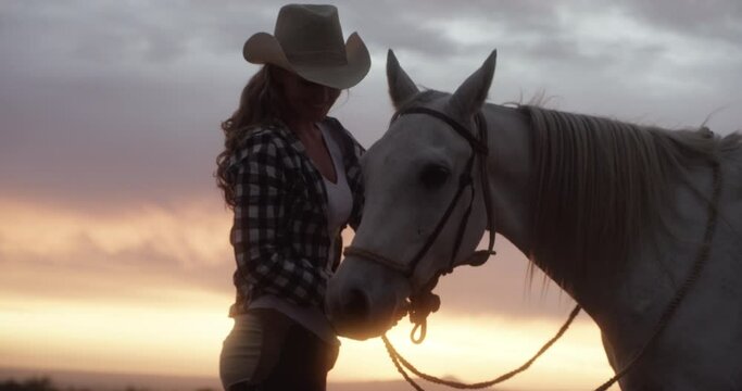 Woman, horse and sunset in countryside or ranch with mockup space and travel. Orange sky, nature and equestrian environment, animal or pet with cow girl outdoor, adventure and horizon with calm