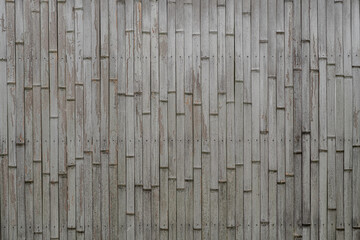 Weathered bamboo Japanese wall.
Bamboo wood fences are used to separate built constructions.
