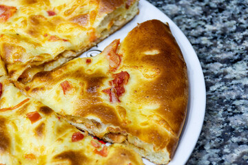 Close-up of delicious slices of Italian pizza on a plate.