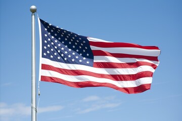 Fototapeta premium Patriotic United States Flag. Independence Day Celebration and American Freedom Festivities. Blue sky in the background.
