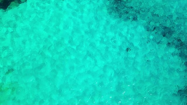 Mallorca, Balearic Islands, Spain. Tropical paradise turquoise bay. Beautiful Mediterranean cave rocky sandy beach with blue water, sunny day in Majorca. Famous tourist attraction Cala Mondrago Beach