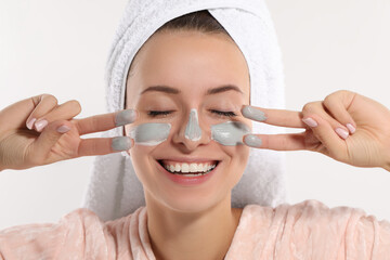 Woman with face mask on white background. Spa treatments