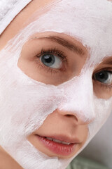 Woman with face mask, closeup. Spa treatments