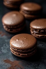 Luxurious chocolate macarons, perfect for gourmet food content. 