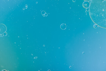 bubbles floating a blue background