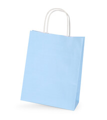 One light blue paper shopping bag on white background