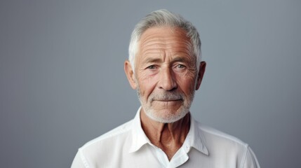 Fototapeta premium Portrait of a friendly old man with a beard