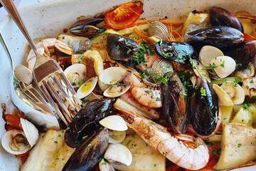 mussels with seafood and vegetables - 706622227
