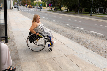 International Wheelchair Day. Person With Short Stature On Wheelchair Waiting For Public Transport...