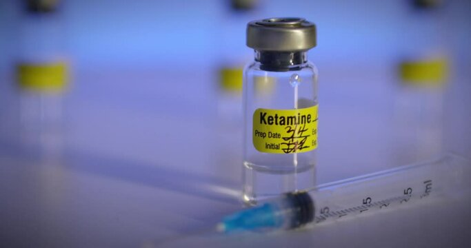 Vial of Ketamine with a Syringe