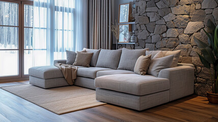 Elegant Living Room with Modern Grey Sectional Sofa and Stone Wall