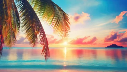 Fototapeten beautiful sea sunset landscape ocean sunrise tropical island beach dawn palm tree leaves silhouette blue water colorful red pink orange yellow sky clouds sun reflection summer holidays vacation © Irene