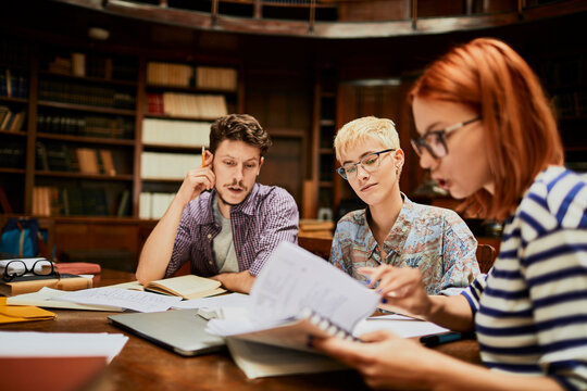 Students Studying Together in College Library
