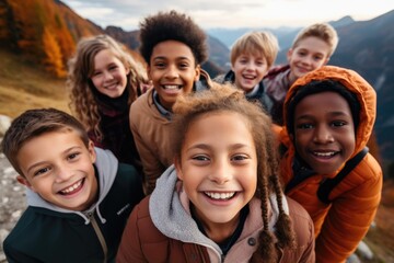 Group of happy children taking selfie on hike in the mountains