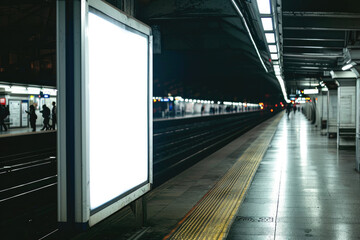 Empty Vertical Billboard at Station Platform