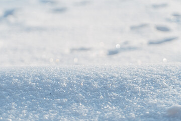 Beautiful snow field on a sunny day. Snow in winter. Frost