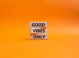 Good Vibes only symbol. Concept words Good Vibes only on wooden blocks. Beautiful yellow background. Business and Good Vibes only concept. Copy space.