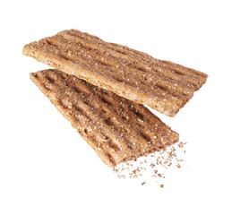 Two pieces of rye wholegrain crispbread close up isolated on white background