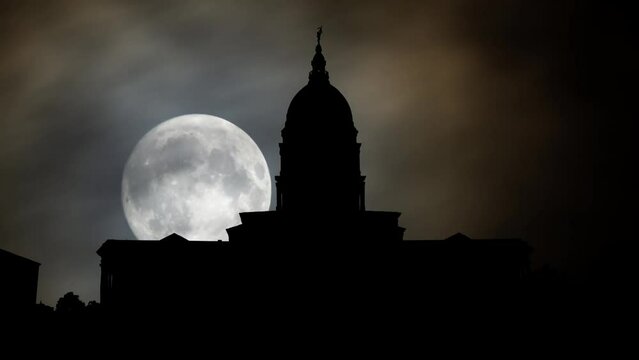 Kansas state capital building in Topeka, Time Lapse by Night with Full Moon, USA