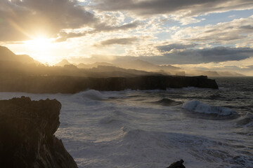 Landscape of big ocean waves on windy sunny day at the atlantic northern coast of Spain