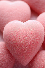Obraz premium Pink heart-shaped candies as background, closeup. Valentine's Day.