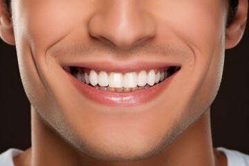Obraz premium Smile with white healthy teeth of young man