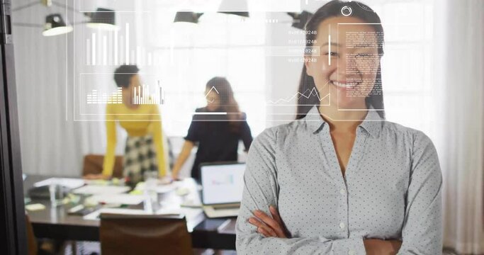 Animation of data processing over asian businesswoman working in office
